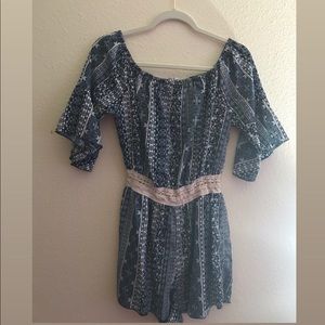 A Blue and White Romper with Stitched in Belt
